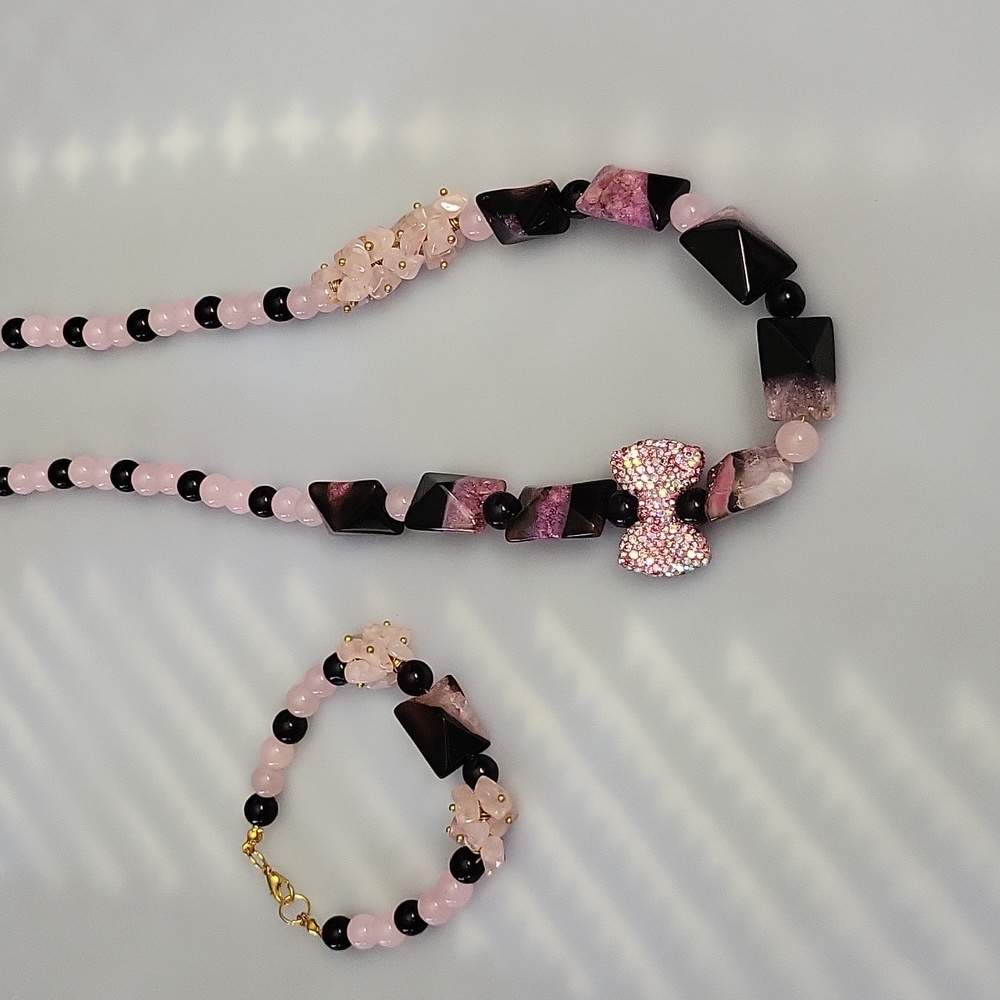 Black and pink beads, necklace, and bracelet